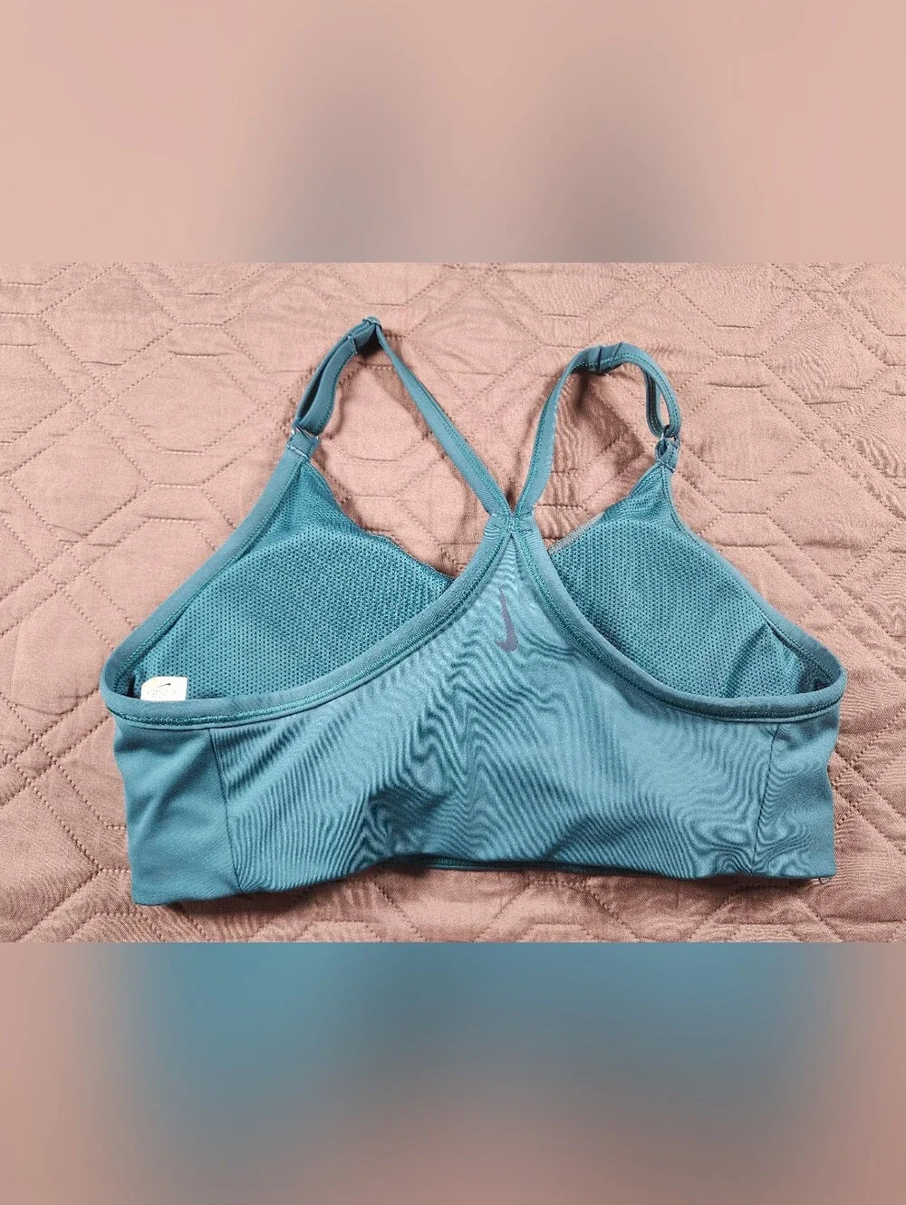 teal Nike Dri-FIT Indy light-support sports bra sparkling metallic tape accents